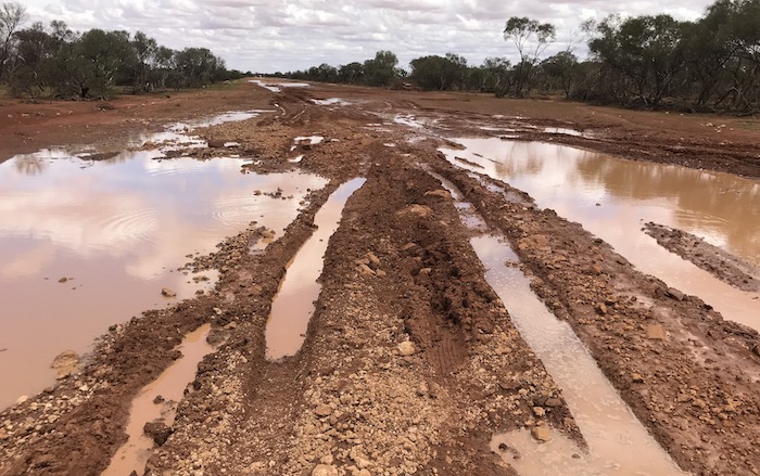 The river flowing across the road for a week caused more damage than the passage of four vehicles, despite appearances.