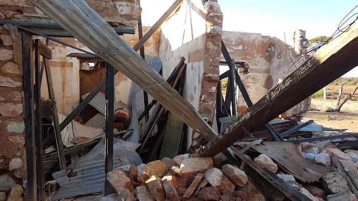 The homestead is in ruins.
