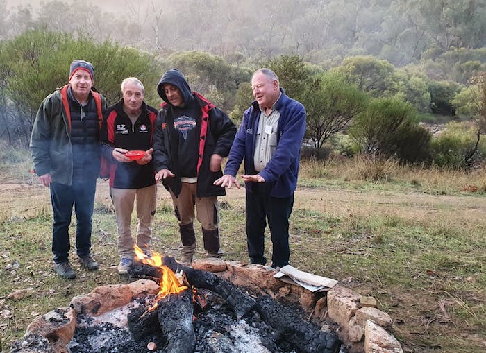 Jeff, Greg, Joe and Kim around the campfire early Saturday morning.