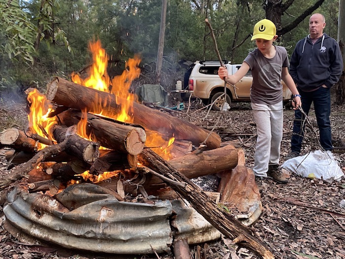 Liam did his bit to load the fire.