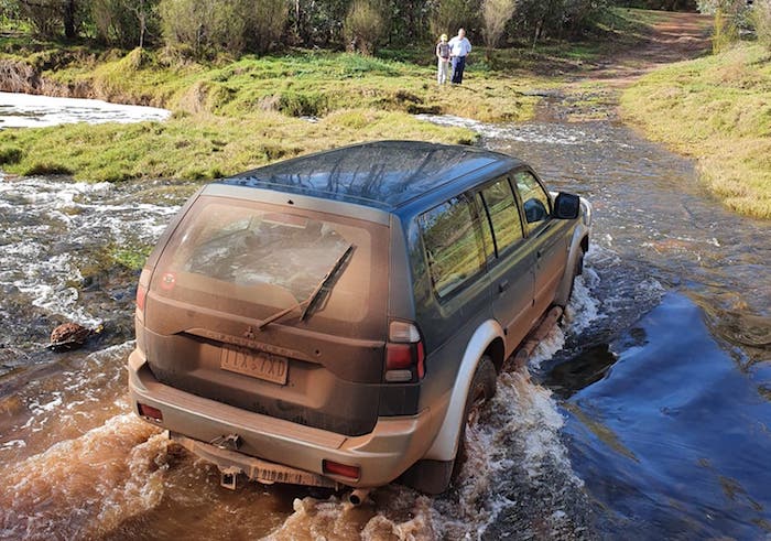 Neil crossing the Blackwood in his Mitsubishi.
