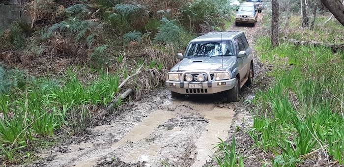 Peter takes the Patrol through the mud.