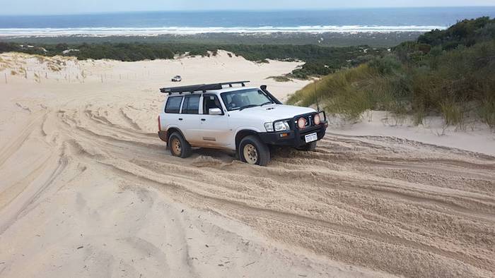 Mike takes his Patrol up Yeagarup Hill.