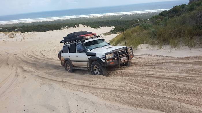 Stuart drivers his 'Cruiser up Yeagarup Hill.