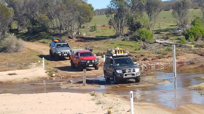 Paul and Andrew in the Pajero, Steve in the Mazda and Aaron the Patrol cross the Phillips River.