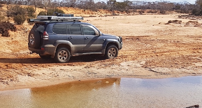 Santokh in his Prado at Ponton Creek.