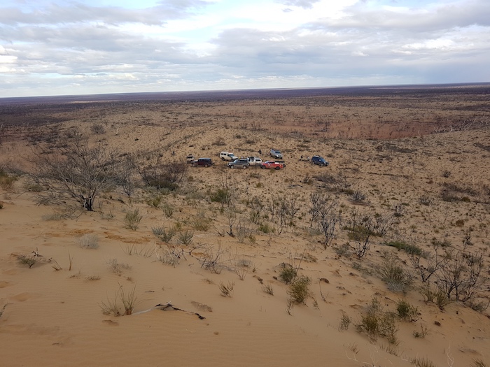 Vehicles parked below Streich Mound.