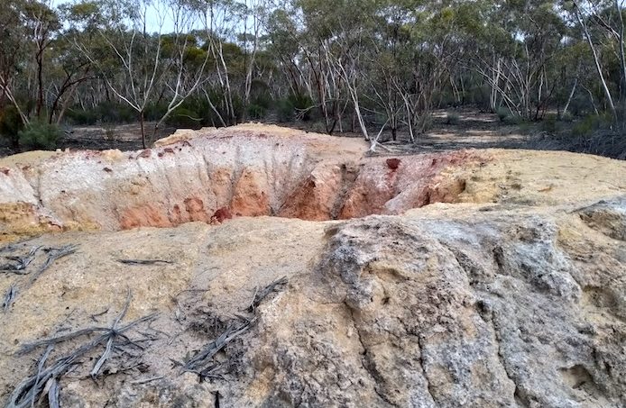 Unnamed pioneer well near World War II airstrip.