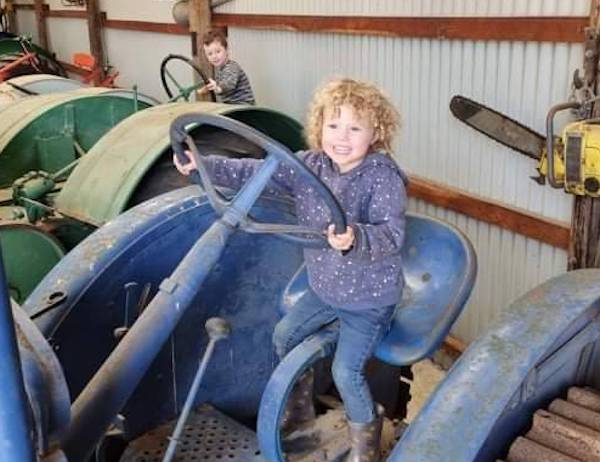 Addison on tractor at Wellstead Museum.